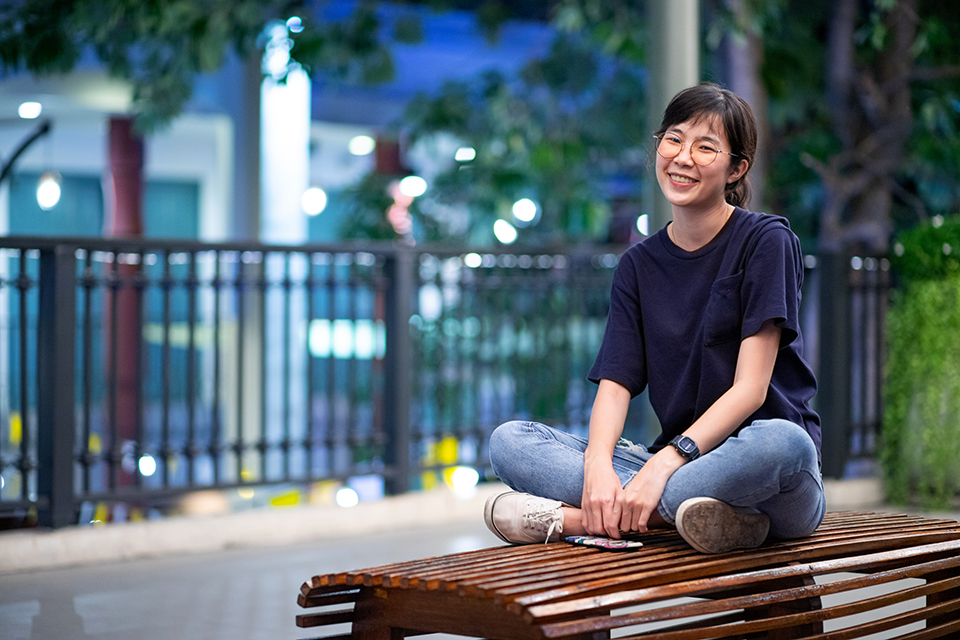 young-woman-sitting-seat-city